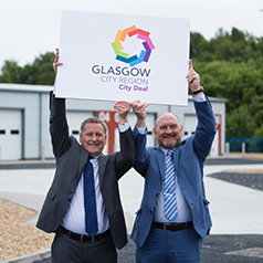 Martin Kiely WH Malcolm & Cllr Tony Buchanan, East Ren, celebrate opening Crossmill Business Park, City Deal board